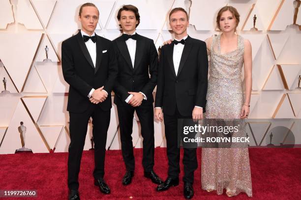 Polish actors Bartosz Bielenia , Tomasz Zietek , Polish director Jan Komasa and Polish actress Eliza Rycembel of "Corpus Christi" arrive for the 92nd...