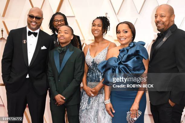 Director Matthew A. Cherry US producer Karen Rupert Toliver and Deandre Arnold , the Texas teen who was told his dreadlocks violated school dress...