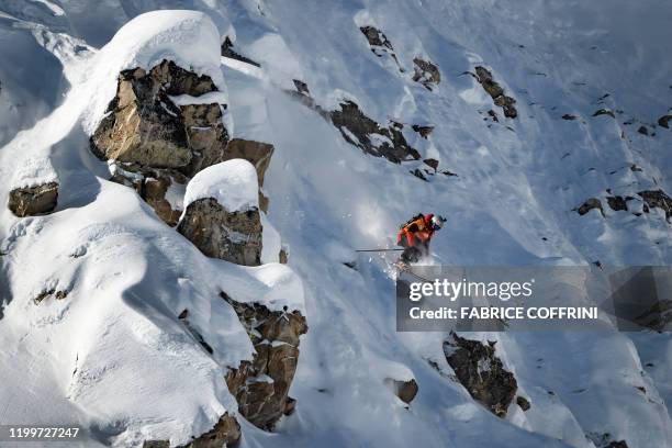 This image taken on February 7, 2020 shows freeride skier Yann Rausis of Switzerland competing during the Men's ski event of the second stage of the...