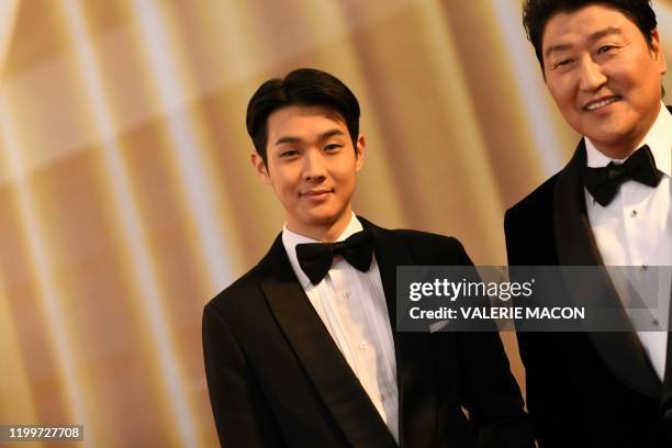 Korean actors Choi Woo Sik and Kong-Ho Song from "Parasite" arrive for the 92nd Oscars at the Dolby Theatre in Hollywood, California on February 9,...
