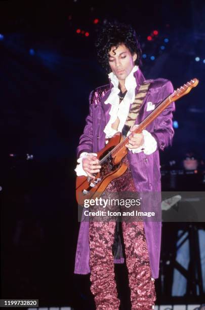 American singer Prince performs onstage during the 1984 Purple Rain Tour on November 4 at the Joe Louis Arena in Detroit, Michigan.