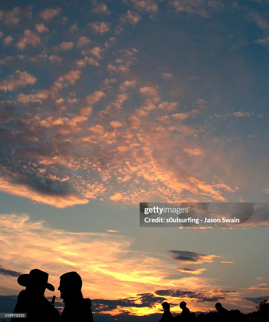 Silhouette sunset at Isle of Wight Festival