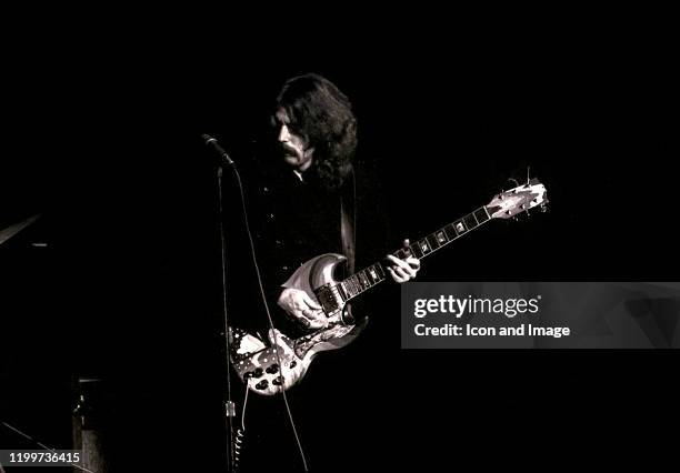 English rock and blues guitarist, singer, and songwriter, Eric Clapton, performs as a member of Cream at the Sam Houston Coliseum on March 31 in...