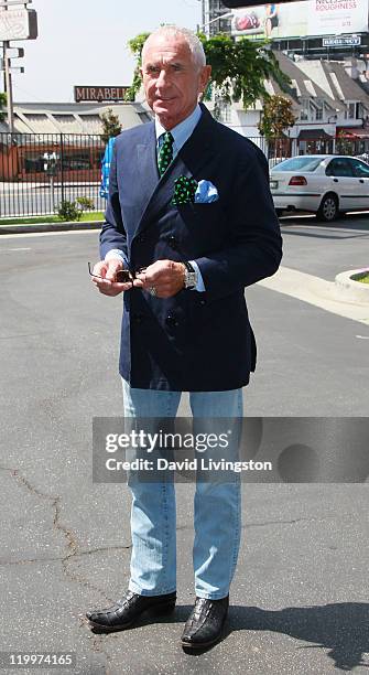 Prince Frederic von Anhalt poses at a 44-foot high billboard on Sunset Blvd celebrating 25 years of marriage to his wife Zsa Zsa Gabor on July 27,...