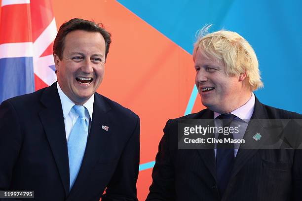 British Prime minister David Cameron and London Mayor Boris Johnson talk during the' London 2012 - One Year To Go' ceremony in Trafalgar Square on...