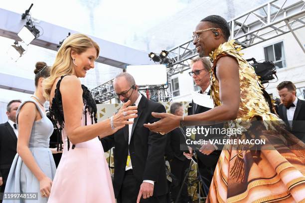 Actress Laura Dern greets US actor Billy Porter as she arrives for the 92nd Oscars at the Dolby Theatre in Hollywood, California on February 9, 2020.