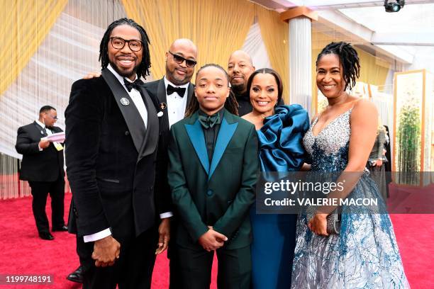 Texas teen Deandre Arnold poses with Karen Rupert and filmmakers of "Hair Love" as they arrive for the 92nd Oscars at the Dolby Theatre in Hollywood,...