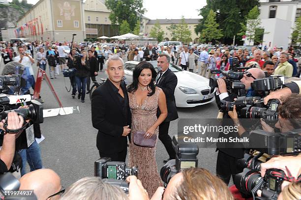 Anna Netrebko and Erwin Schrott arrive for the 'Le nozze di Figaro" premiere during the Salzburg Festival on July 27, 2011 in Salzburg, Austria.