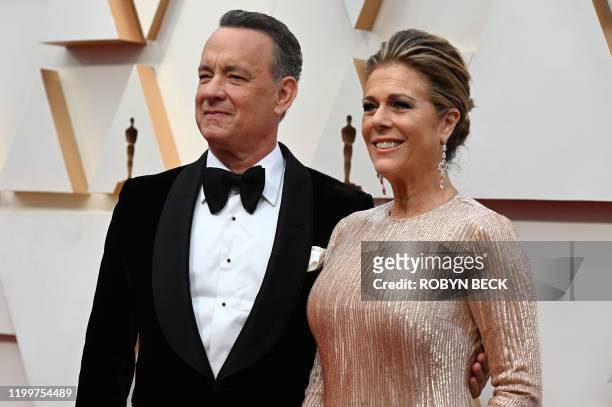 Actor Tom Hanks and wife Rita Wilson arrive for the 92nd Oscars at the Dolby Theatre in Hollywood, California on February 9, 2020.