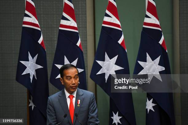 Indonesian President Joko Widodo speaks during his address to the the Australian Parliament in the House of Representatives at Parliament House on...