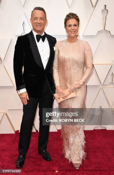 Actor Tom Hanks and his wife actress Rita WIlson arrive for the 92nd Oscars at the Dolby Theatre in Hollywood, California on February 9, 2020.