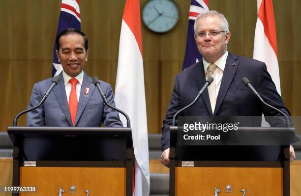 Indonesian President Joko Widodo and Australian Prime Minister Scott Morrison give a joint statement at Parliament House on February 10, 2020 in...