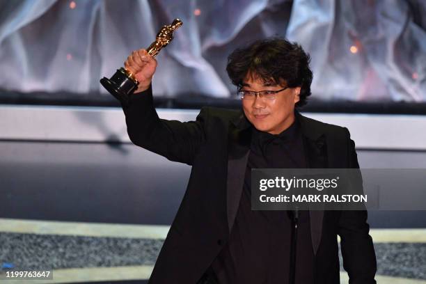 South Korean director Bong Joon-ho accepts the award for Best International Feature Film for "Parasite" during the 92nd Oscars at the Dolby Theatre...