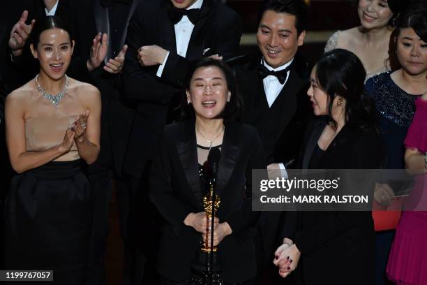 "Parasite" producer Kwak Sin-ae accepts the award for Best Picture for "Parasite" during the 92nd Oscars at the Dolby Theatre in Hollywood,...