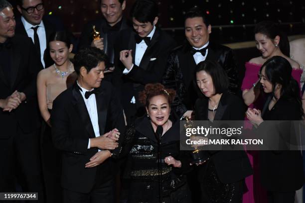 "Parasite" producer Kwak Sin-ae, alongside cast and crew accept the award for Best Picture for "Parasite" during the 92nd Oscars at the Dolby Theatre...