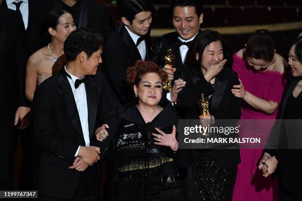 "Parasite" producer Kwak Sin-ae , alongside cast and crew, accept the award for Best Picture for "Parasite" during the 92nd Oscars at the Dolby...