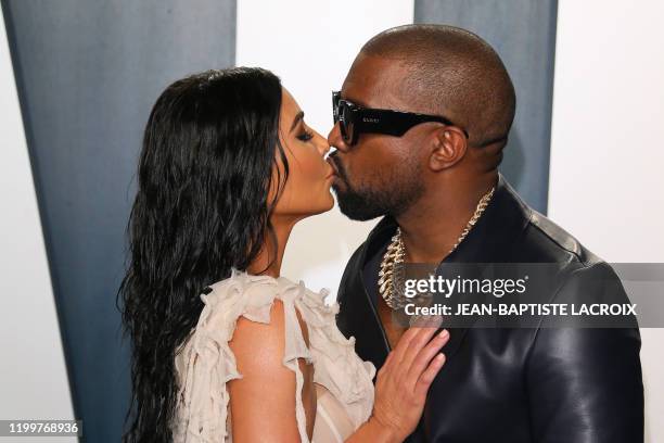 Media personality Kim Kardashian and husband US rapper Kanye West attend the 2020 Vanity Fair Oscar Party following the 92nd Oscars at The Wallis...