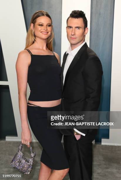 Singer Adam Levine and his wife Namibian model Behati Prinsloo attend the 2020 Vanity Fair Oscar Party following the 92nd Oscars at The Wallis...