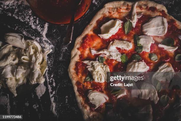 making an italian pizza at home - metal grate stock pictures, royalty-free photos & images