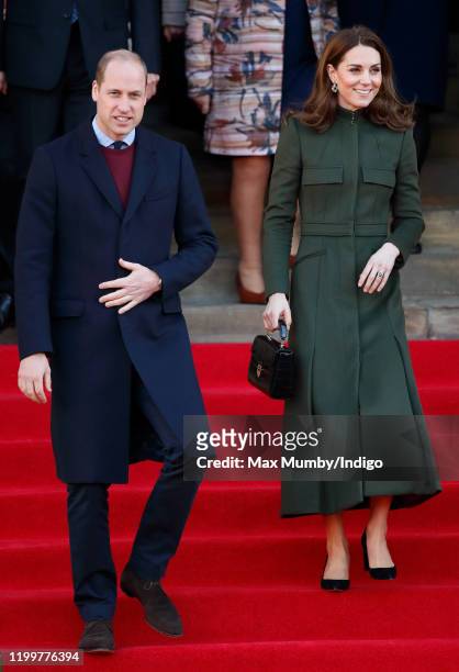 Prince William, Duke of Cambridge and Catherine, Duchess of Cambridge depart City Hall in Bradford's Centenary Square before meeting members of the...