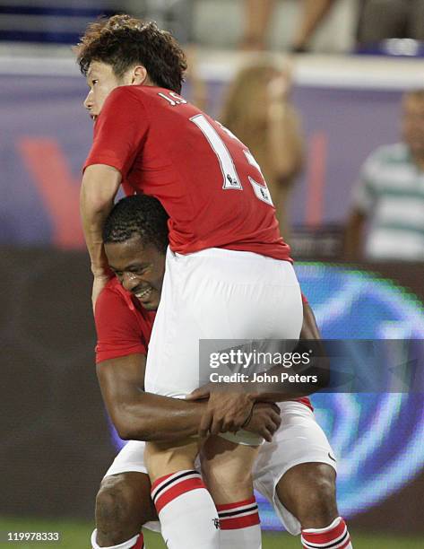 Ji-Sung Park of Manchester United celebrates scoring their second goal during the MLS All Star match between MLS All Stars and Manchester United at...