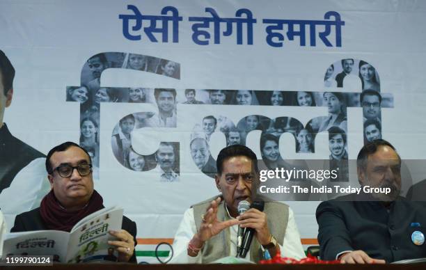 Delhi Pradesh Congress Committee president, Subhash Chopra along with Ajay Maken and Anand Sharma while releasing the Congress manifesto for Delhi...