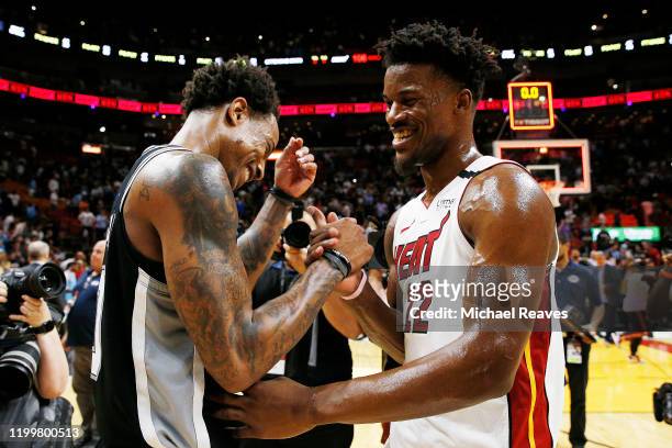 Jimmy Butler of the Miami Heat greets DeMar DeRozan of the San Antonio Spurs after the game at American Airlines Arena on January 15, 2020 in Miami,...