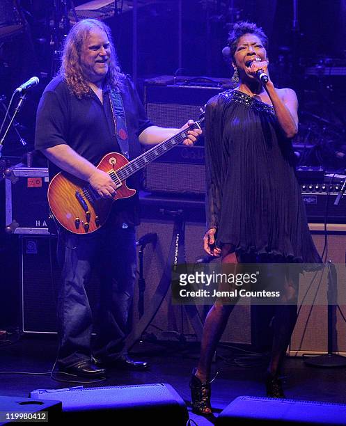 Guitarist Warren Haynes of the Allman Brothers and singer Natalie Cole perform at the Beacon Theatre on July 27, 2011 in New York City.