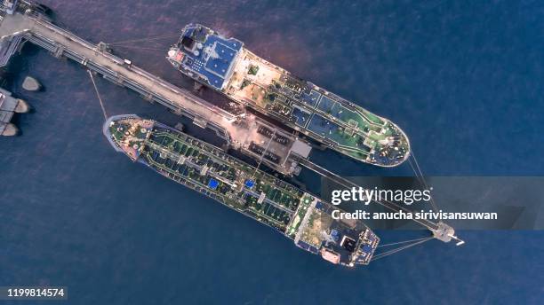 aerial top view oil tankers park at oil port. - amphibian stock pictures, royalty-free photos & images