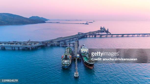 aerial top view oil tankers park at oil port. - jakarta stock pictures, royalty-free photos & images