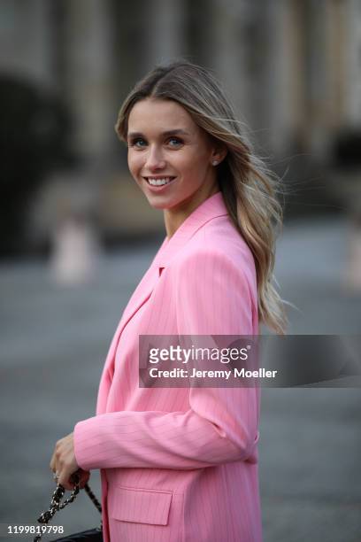 Scarlett Gartmann wearing Marc Cain complete look and Chanel bag during the Berlin Fashion Week Autumn/Winter 2020 on January 14, 2020 in Berlin,...