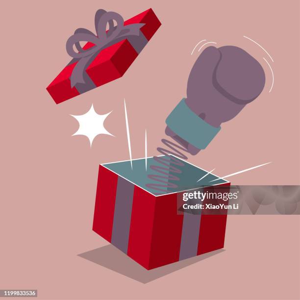 boxing gloves pop out of gift box. isolated on brown background. - boxing glove stock illustrations