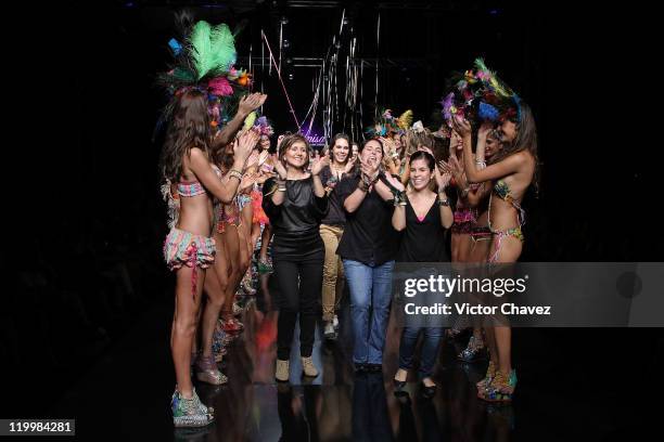 Leonisa fashion designer and models walk the runway on the third day of Colombiamoda 2011 at Museo De Arte Moderno de Medellin on July 27, 2011 in...