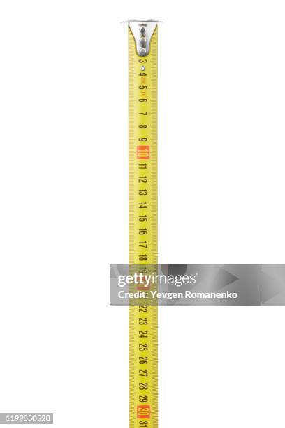 measuring tape isolated on white background - ruler stock-fotos und bilder
