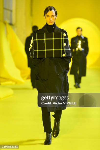 Model walks the runway during the Raf Simons Menswear Fall/Winter 2020-2021 show as part of Paris Fashion Week on January 15, 2020 in Paris, France.