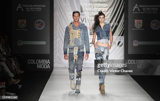 Models walk the runway during the Fundacion Universitaria Del Area Andina show on day two of Colombiamoda 2011 at Plaza Mayor on July 26, 2011 in...