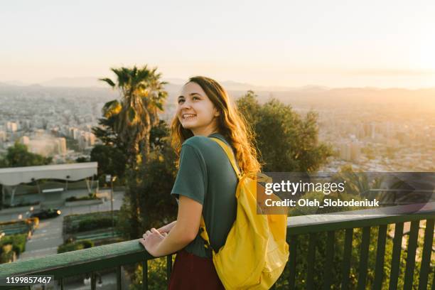 woman in santiago at sunset - santiago chile sunset stock pictures, royalty-free photos & images