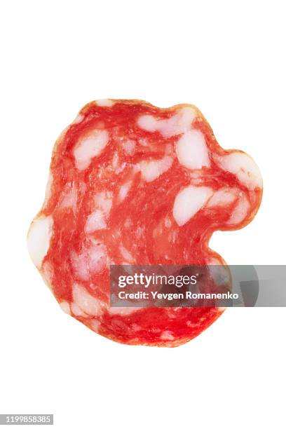 slice of salami sausage isolated on white background - salami stock-fotos und bilder