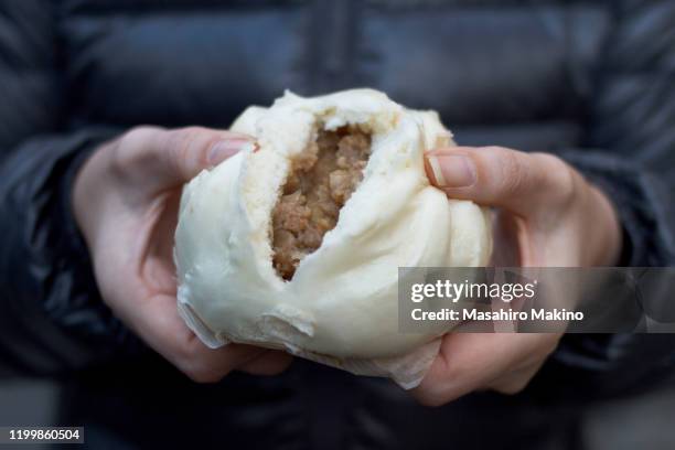 steamed meat bun - chinese steamed bun stock-fotos und bilder