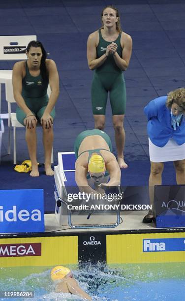 Australia's Kylie Palmer dive as Angie Bainbridge swims next to Blair Evans and Bronte Barratt as they compete in the final of the women's...