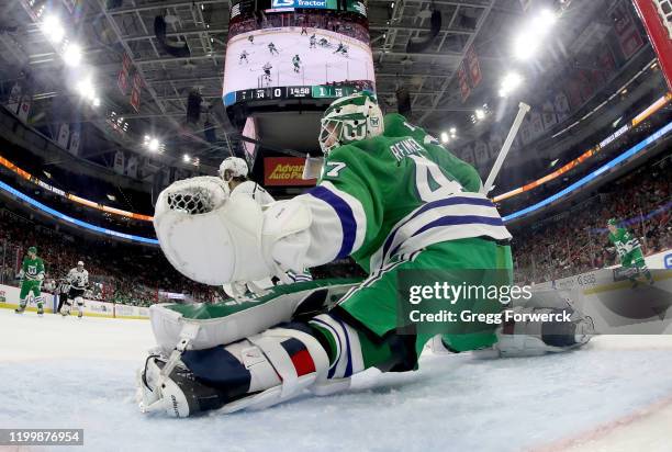 James Reimer of the Carolina Hurricanes goes down in the crease to protect the net during an NHL game against the Los Angeles Kings on January 11,...