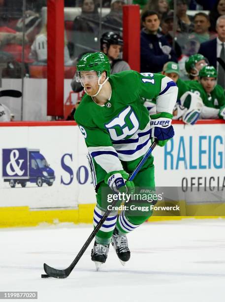 Dougie Hamilton of the Carolina Hurricanes controls the puck on the ice during an NHL game against the Los Angeles Kings on January 11, 2020 at PNC...