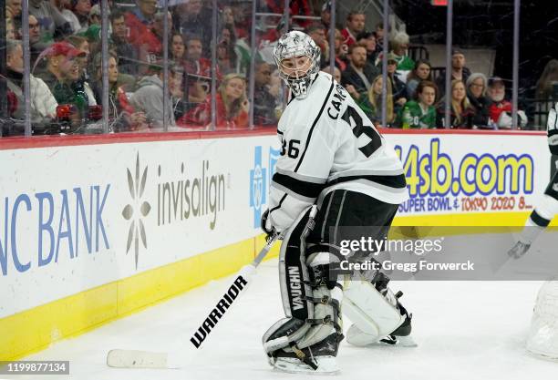 Jack Campbell of the Los Angeles Kings plays the puck behind the net during an NHL game against the Carolina Hurricanes on January 11, 2020 at PNC...