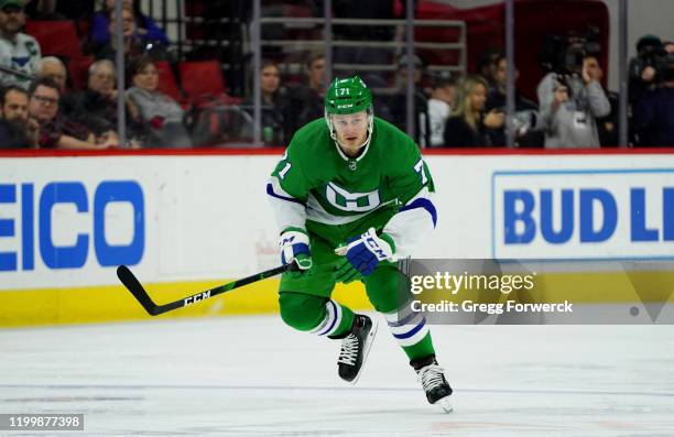 Lucas Wallmark of the Carolina Hurricanes skates for position the ice during an NHL game against the Los Angeles Kings on January 11, 2020 at PNC...