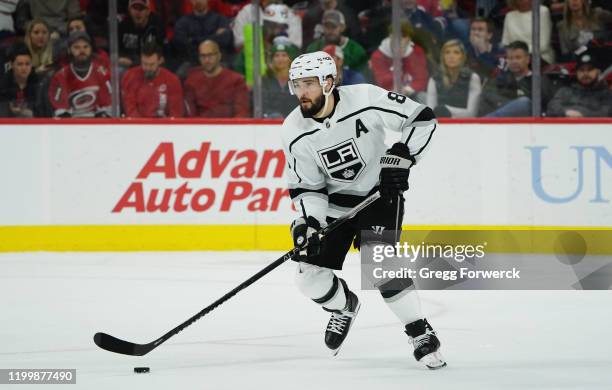 Drew Doughty of the Los Angeles Kings skates with the puck during an NHL game against the Carolina Hurricanes on January 11, 2020 at PNC Arena in...