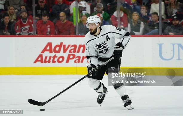 Drew Doughty of the Los Angeles Kings skates with the puck during an NHL game against the Carolina Hurricanes on January 11, 2020 at PNC Arena in...