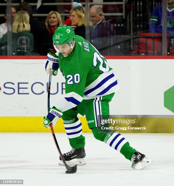 Sebastian Aho of the Carolina Hurricanes shoots the puck during an NHL game against the Los Angeles Kings on January 11, 2020 at PNC Arena in...