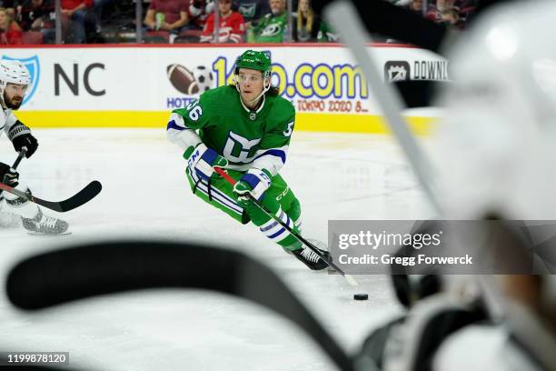 Erik Haula of the Carolina Hurricanes controls the puck on the ice during an NHL game against the Los Angeles Kings on January 11, 2020 at PNC Arena...