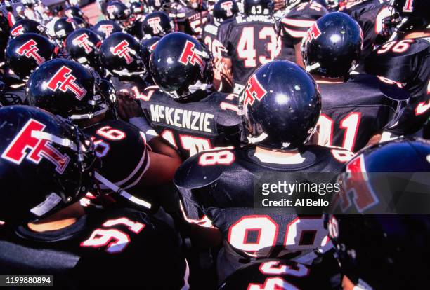 Malcolm McKenzie, Wide Receiver for the Texas Tech Red Raiders stands in the middle of the team huddle before the NCAA Southwest college football...