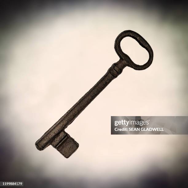 vintage metal door key - ornate key stock pictures, royalty-free photos & images